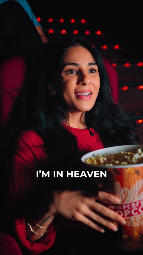 Instagram post by @youtwotv for AMC Theatres. Caption reads: [...] way to disconnect is to reconnect at AMC....