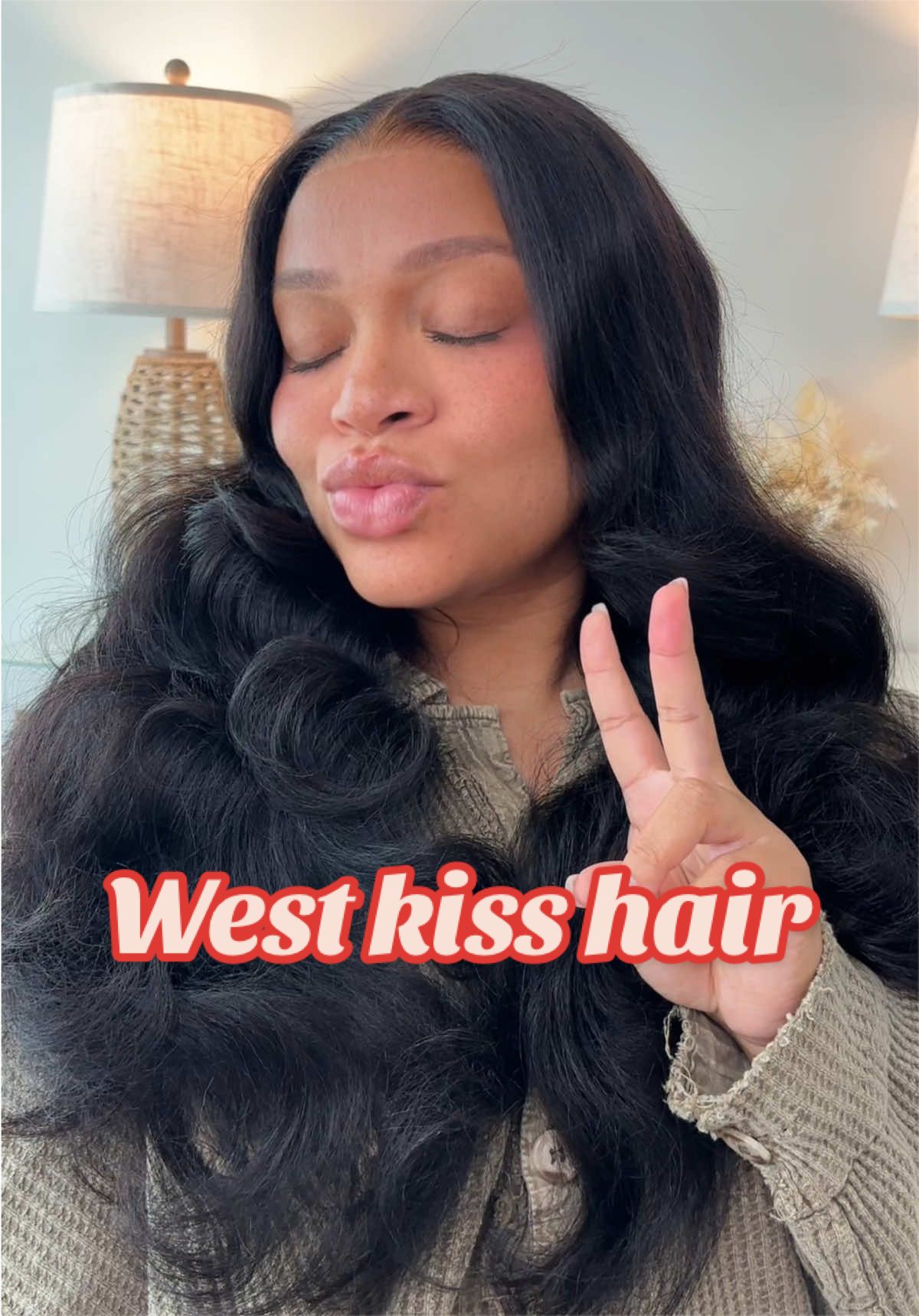TikTok post by @days.withdesi for West Kiss Hair. Caption reads: [...] so easy #wig #wigtok #wiginfluencer....