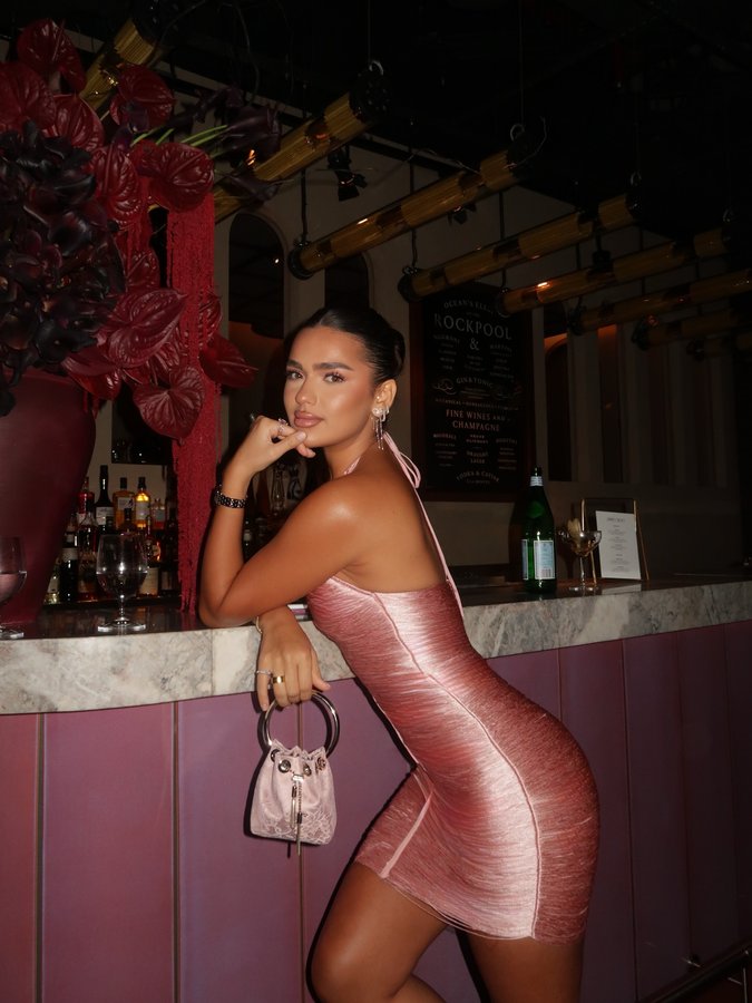 Instagram post by @dianasamman_ for Jimmy Choo. Caption reads: 🍸 @jimmychoo.