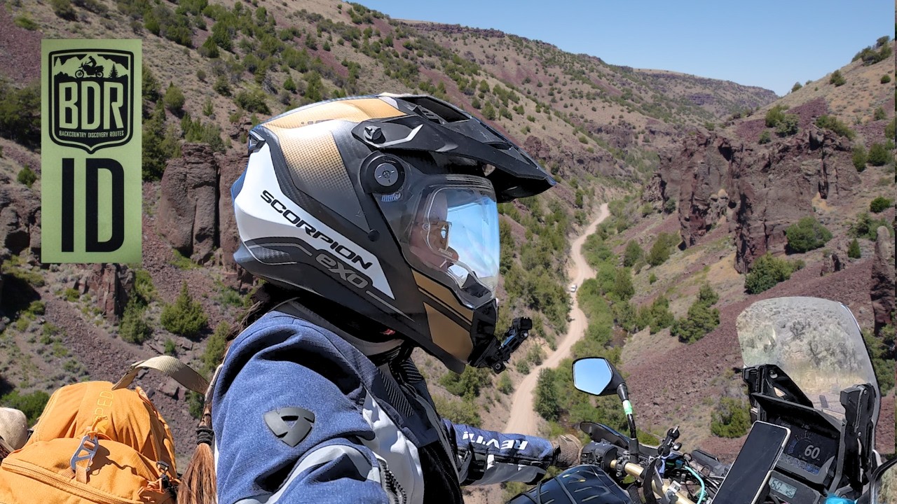 YouTube post by @AstheMagpieFlies for Olight. Caption reads: Idaho BDR Section 1: Ghost Towns, ADV & Motorcycle....