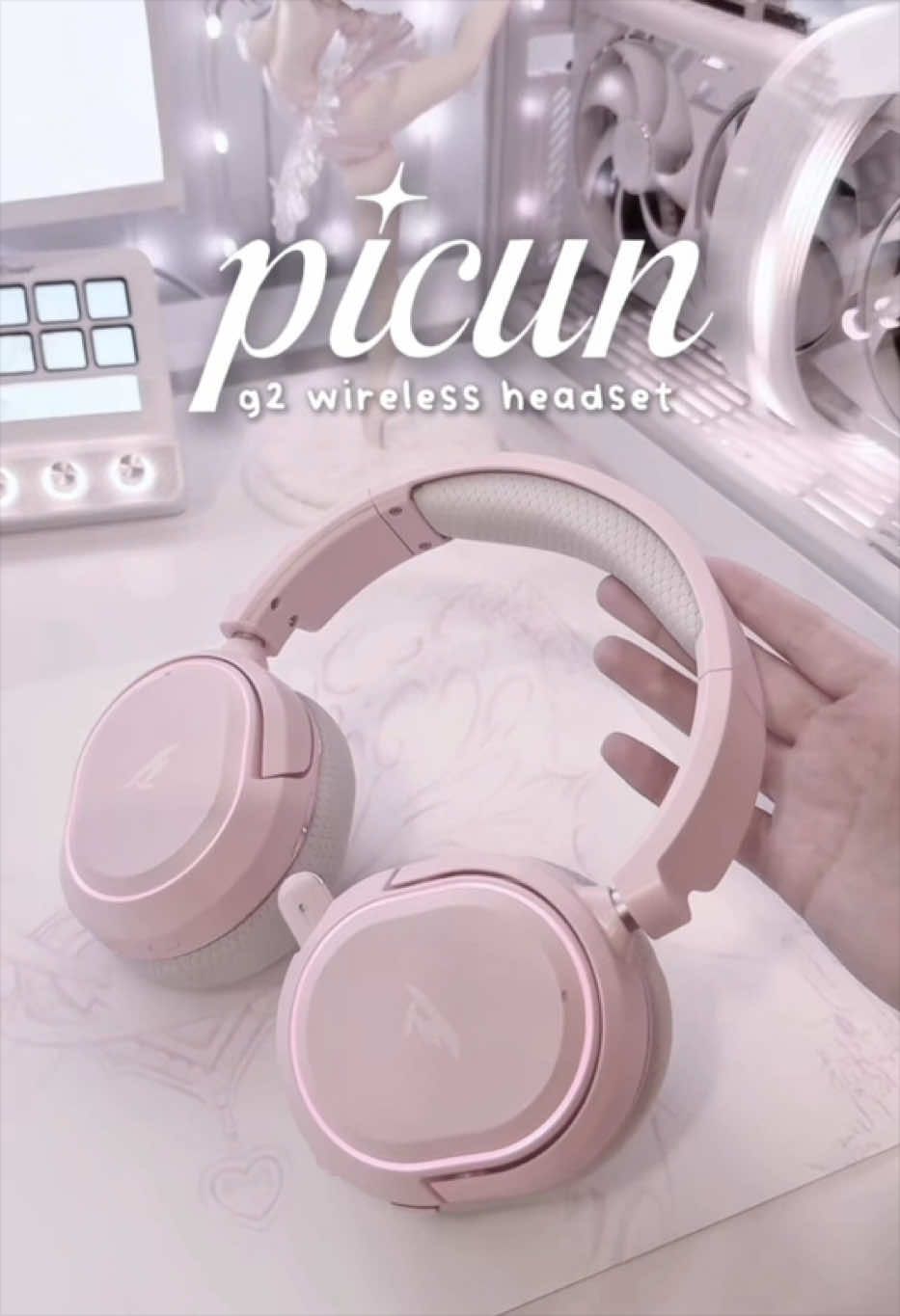 TikTok post by @efferdescent for Picun. Caption reads: these are my DREAM pink headphones 🫶🏼💕 @Picun....