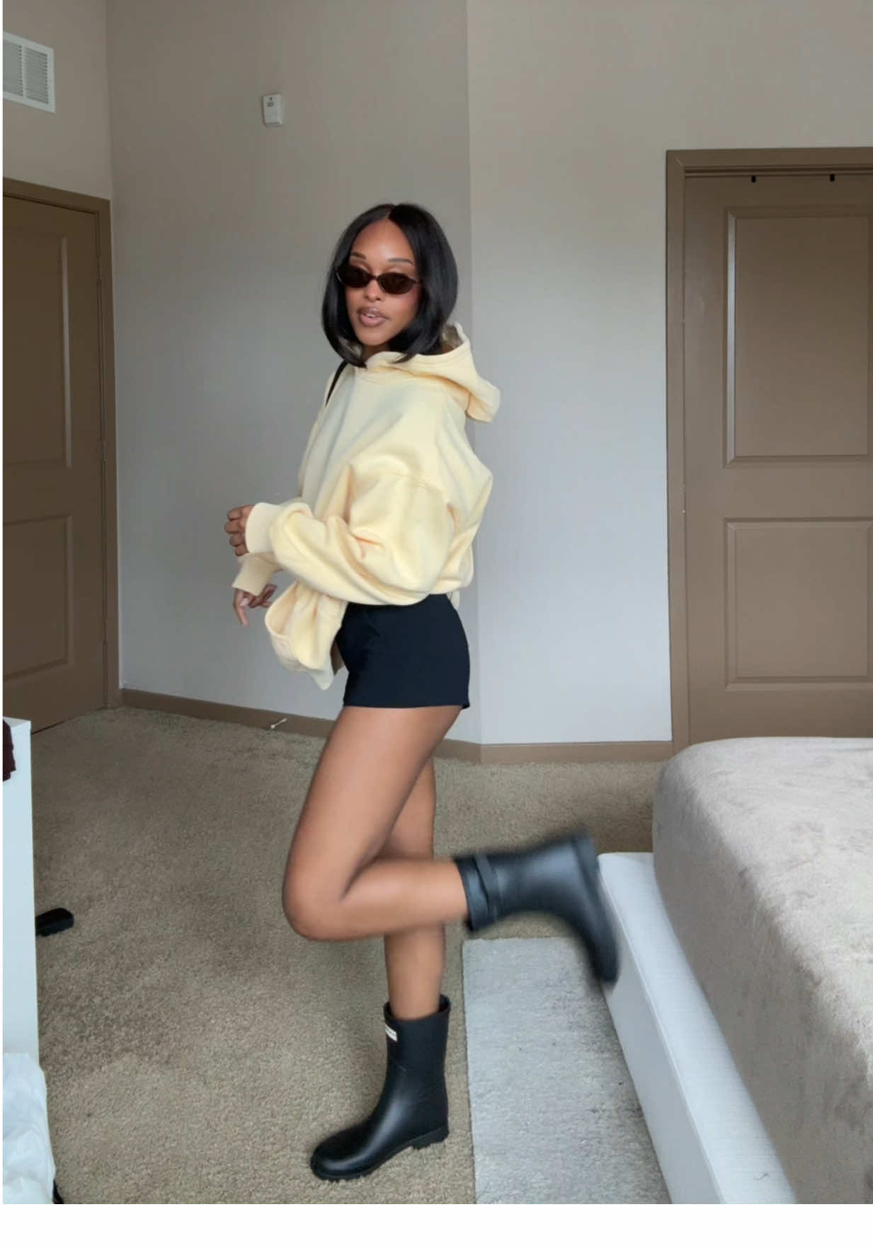 TikTok post by @aaliyahtanza for Hunter Boots. Caption reads: [...] @Princess Polly @Aritzia @Hunter Boots.