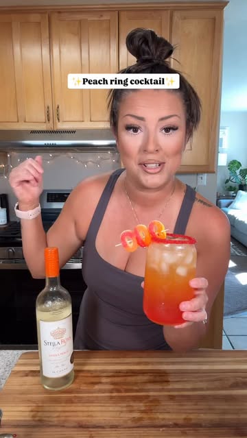 Instagram post by @malinda.rocha for Stella Rosa Wines. Caption reads: Candy peach ring cocktail using @stellarosa Peach....