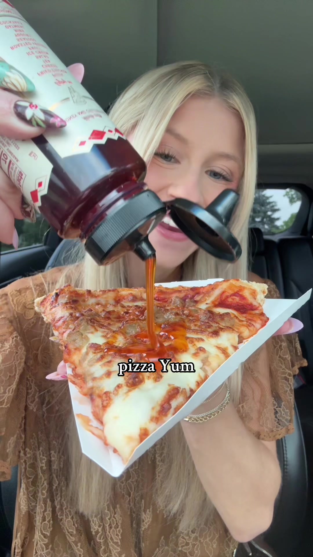 TikTok post by @eatsbynat for Mike's Hot Honey. Caption reads: POV: Mike’s Hot Honey is good on everything 🔥🍯....