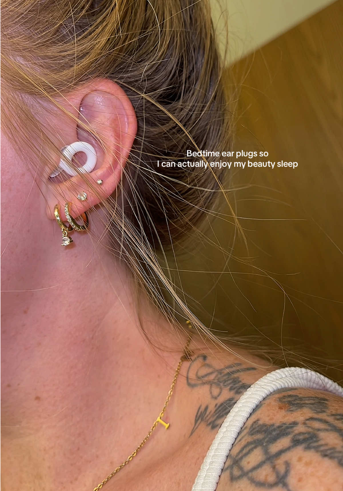 TikTok post by @stylebybrittxo for Loop Earplugs. Caption reads: [...] ounce of REM sleep with @Loop Earplugs US....