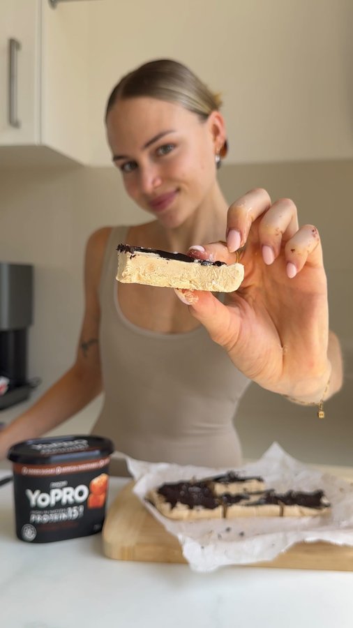 Instagram post by @chenoahill for YoPRO. Caption reads: choc peanut butter frozen yoghurt bars....