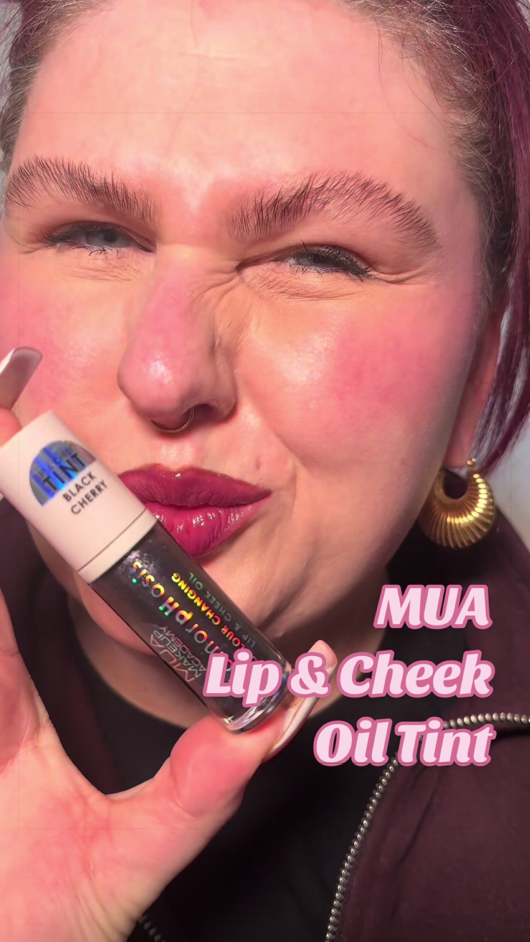 TikTok post by @michaelarosekidd for MUA Cosmetics Maroc. Caption reads: This Metamorphosis Tint Lip & Cheek Oil in ‘Black....