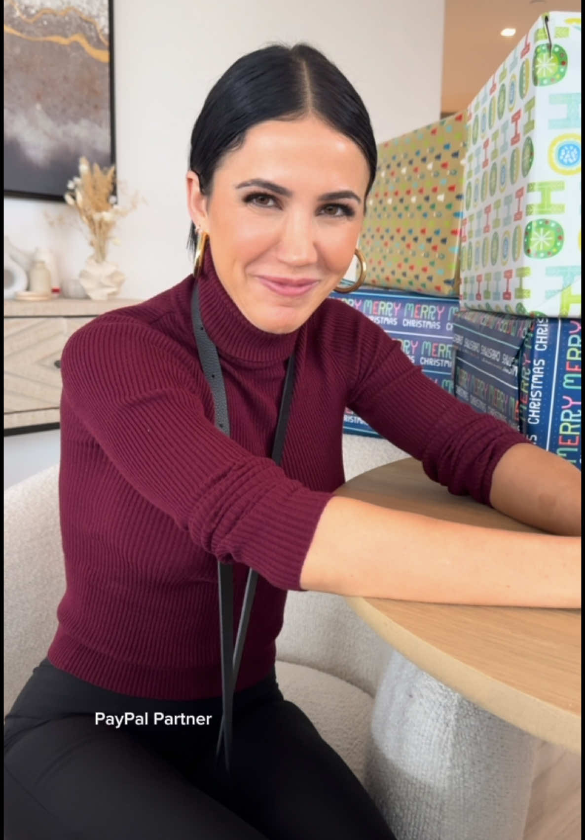 TikTok post by @katstickler for PayPal. Caption reads: This is the spirit of Christmas according to my....