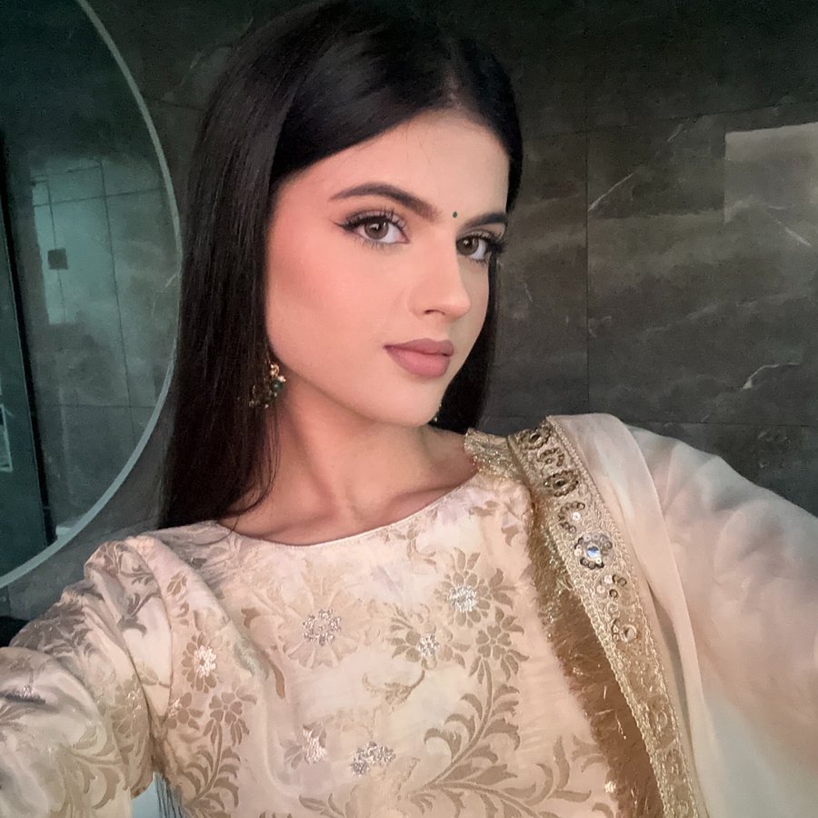 Instagram post by @glambybains for Dimple Color. Caption reads: wearing ‘radiant hazel’ from @dimple.color new....