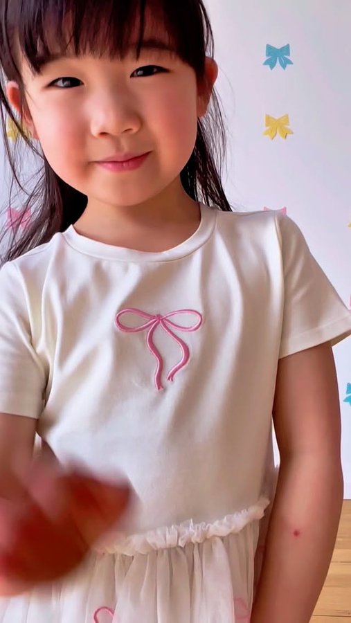 Instagram post by @jarrodandamelia for Kmart. Caption reads: When the kids’ outfit is cute and budget friendly....