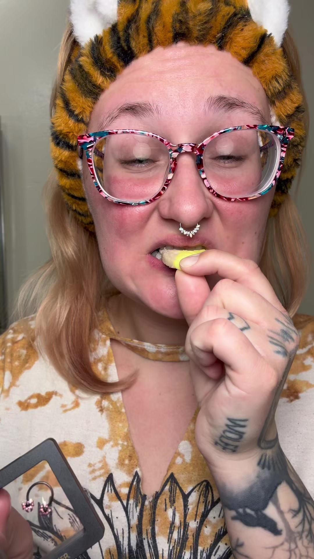 TikTok post by @haleywandersbyfaith for Oufer Body Jewelry. Caption reads: Cutie bow septum ring 🎀    @Oufer Store   ....