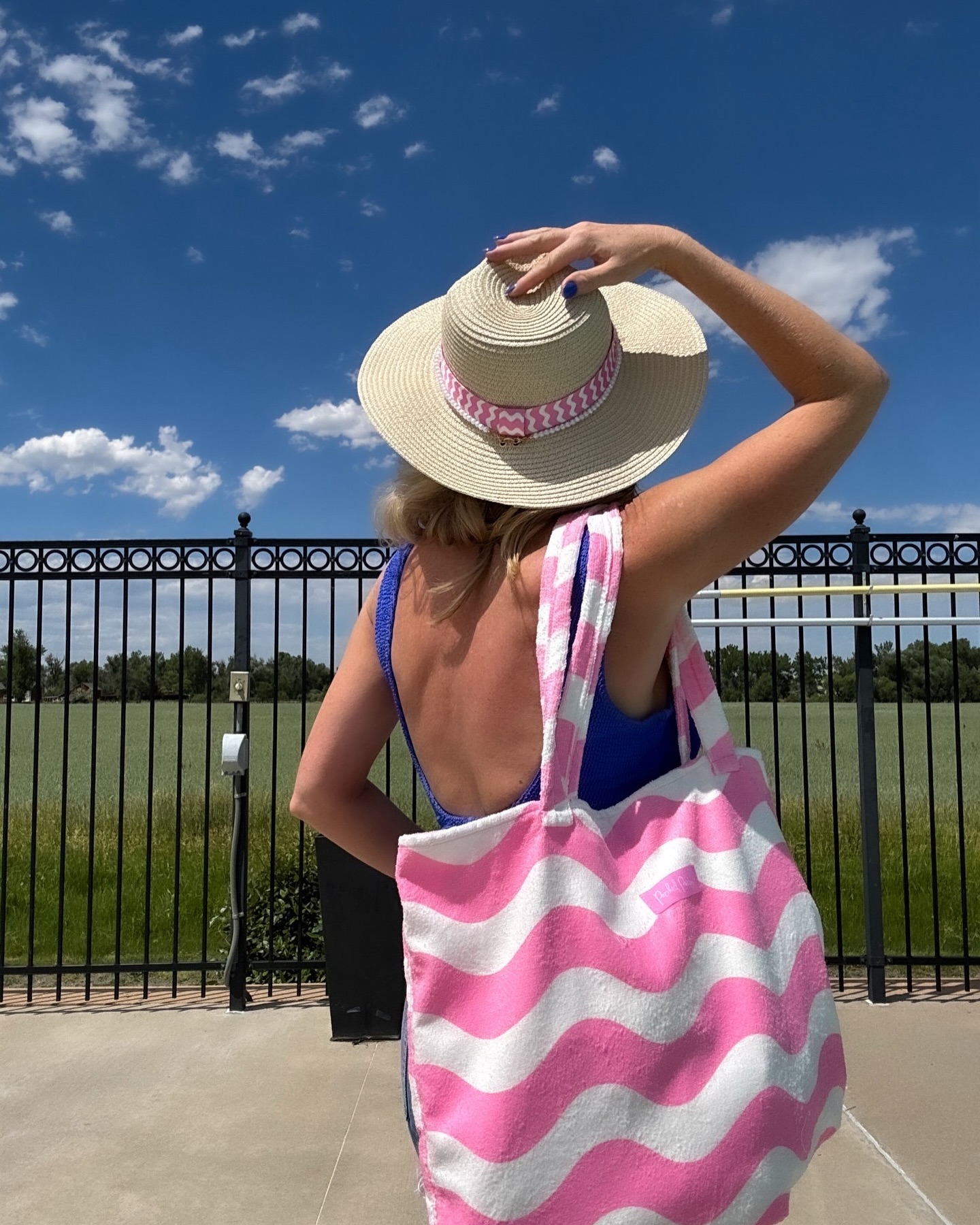 Instagram post by @meganzarcone for Free People. Caption reads: Party of 1 🎉 at the Boulder Reservoir and I....