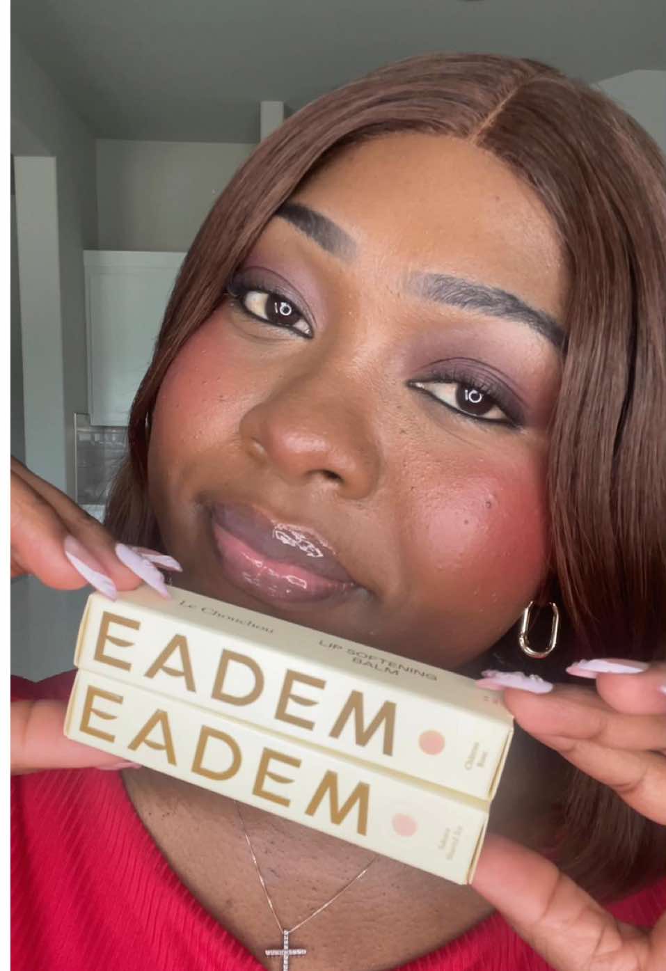 TikTok post by @breord0 for Eadem. Caption reads: Stepping into spring with the new @EADEM lip balms....