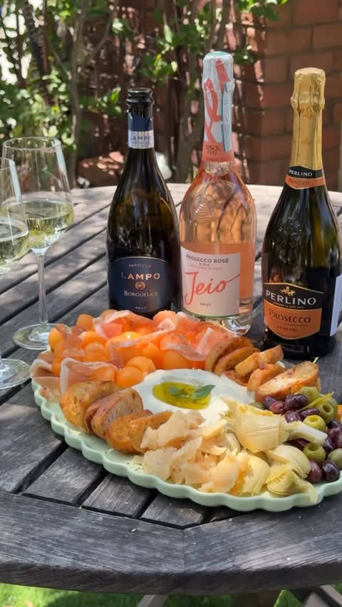 Instagram post by @saturdaytable for Prosecco DOC. Caption reads: [...] aperitivo board, a chilled bottle of....