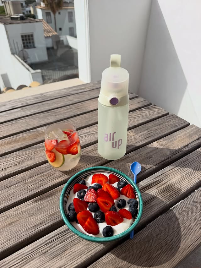 Instagram post by @montanfilippa for air up. Caption reads: hydration, but make it cute 💧🍓 @airup (ad).