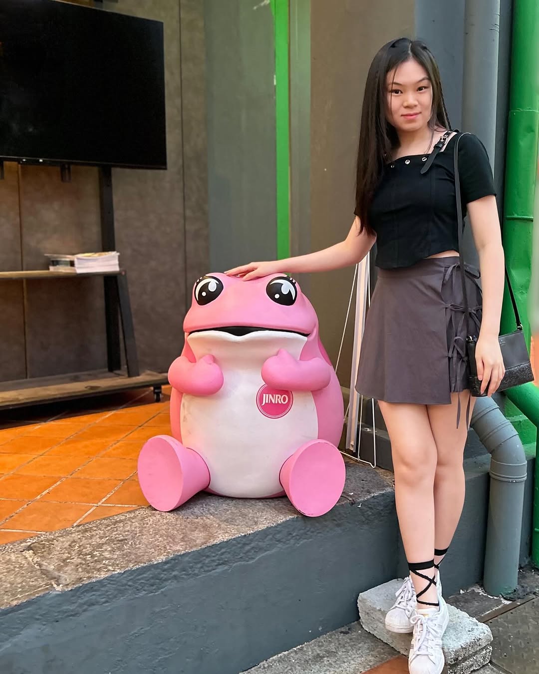 Instagram post by @pinkcancanz for HiteJinro Global. Caption reads: Spot and snap 📸🐸

I was hunting for a cute Jinro....