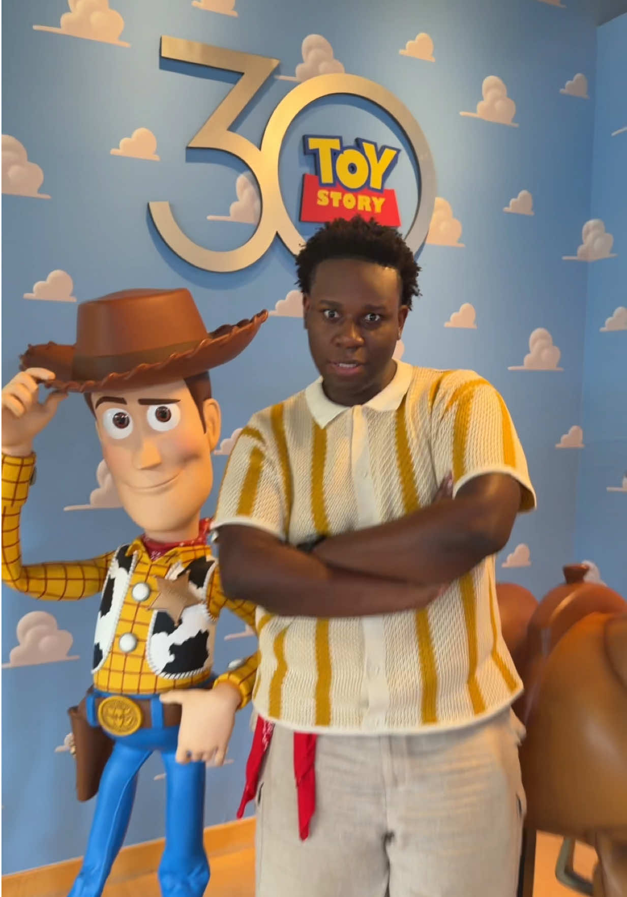 TikTok post by @oneilthomas97 for Pixar. Caption reads: Woody has my back ALWAYS 🤠 @Pixar #ToyStory30.