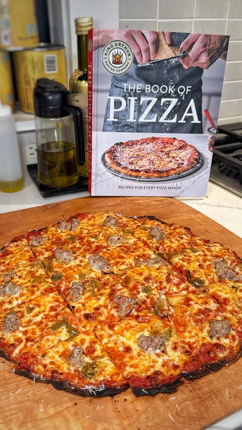 Instagram post by @davespizzaoven for King Arthur Baking Company. Caption reads: This might be the best Chicago Tavern pizza I’ve....