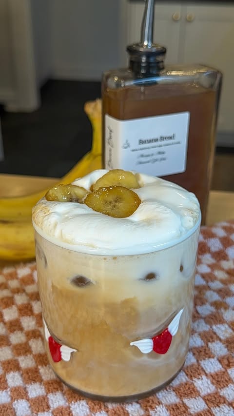 Instagram post by @munchiesbymallory for Anthropologie. Caption reads: banana bread latte 🍌☕️

Okay but seriously…....