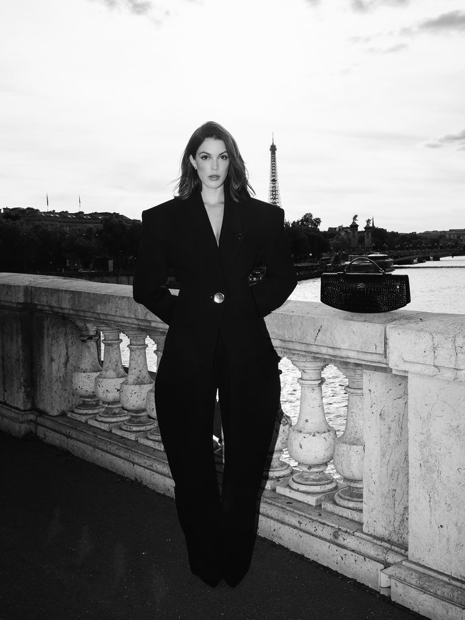 Instagram post by @irismittenaere for KARL LAGERFELD. Caption reads: Rocking this all black look by @karllagerfeld in....
