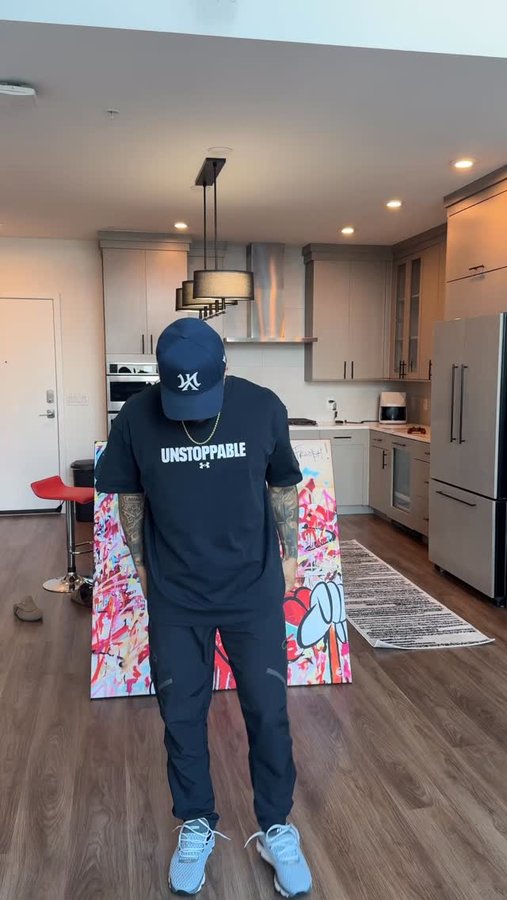 Instagram post by @mannyfressssh for Champs Sports. Caption reads: #Ad Ready to hit the store in my new @underarmour....