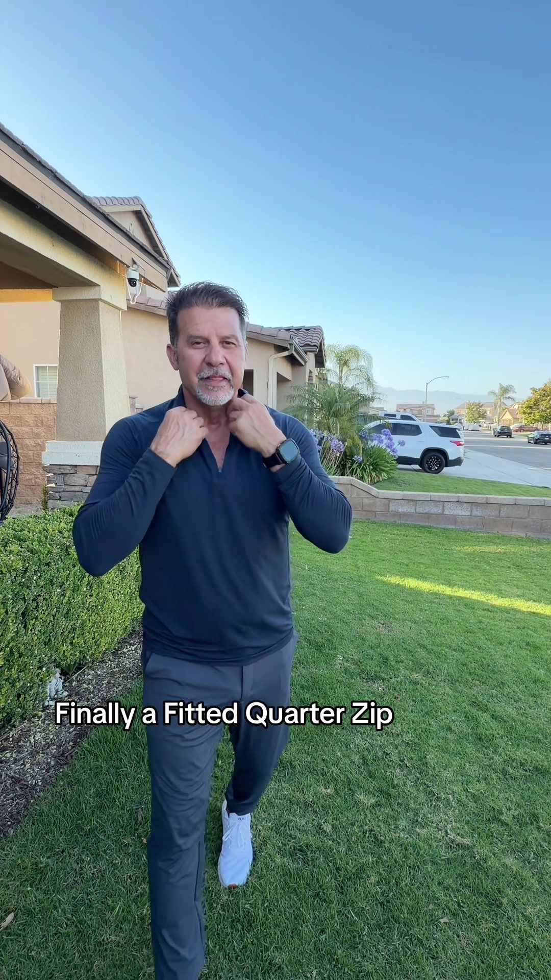 TikTok post by @realmikec_ for Squidhaus. Caption reads: This Quarter Zip is a 10/10 Perfect. She’s....