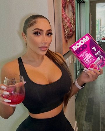 Instagram post by @missnikkiibaby for BOOMBOD. Caption reads: #ad My @boombod shots are back to help whip this....