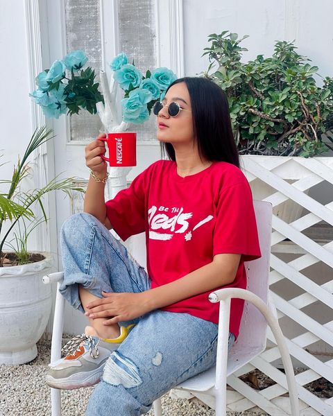 Instagram post by an influencer for NESCAFÉ Pakistan. Caption reads: The morning cup of coffee has an exhilaration....