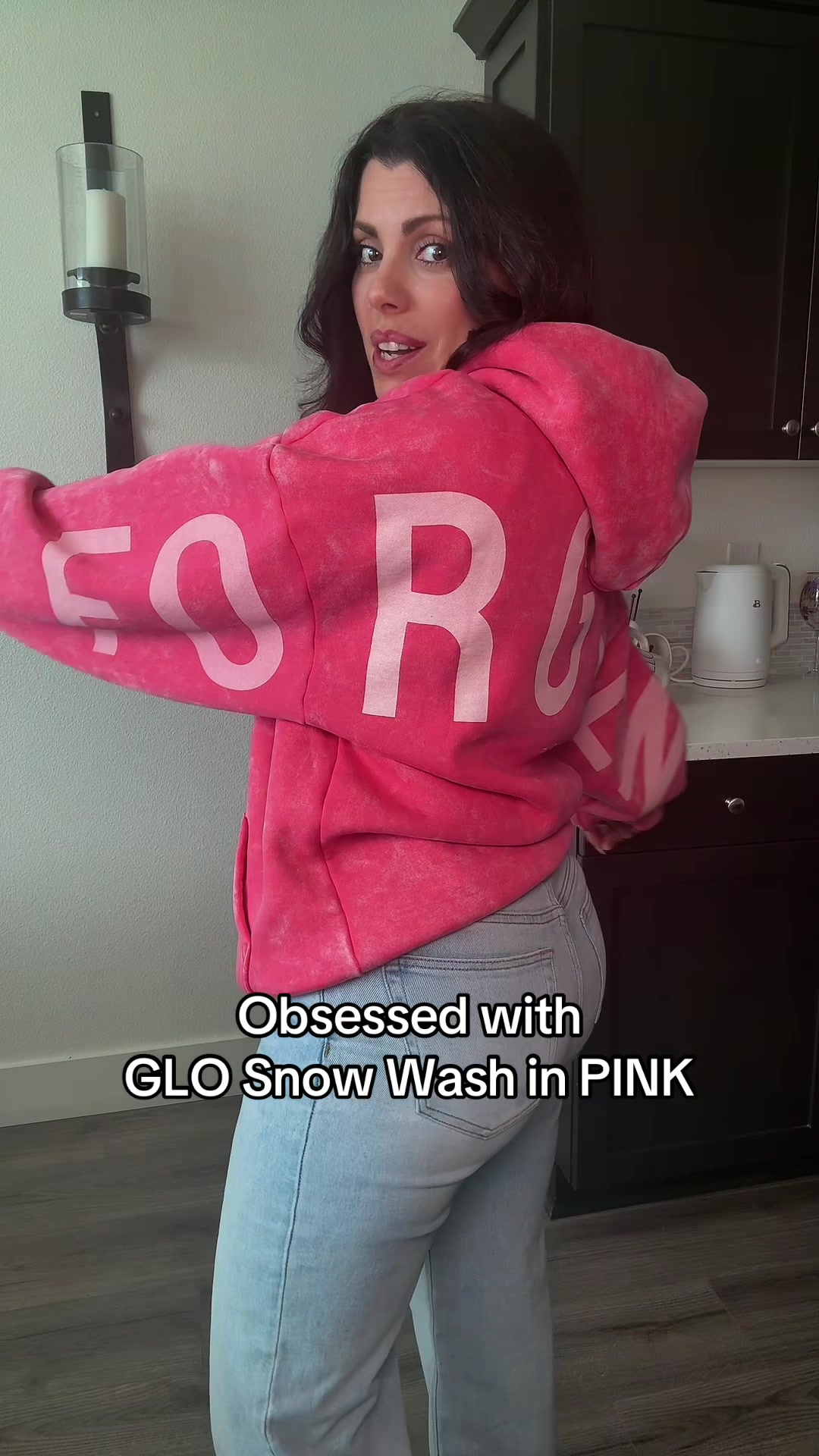 TikTok post by @tiffanyrodeman for God's Love Overcomes. Caption reads: GLO Snow Wash Hoodie is so good! The quality of....