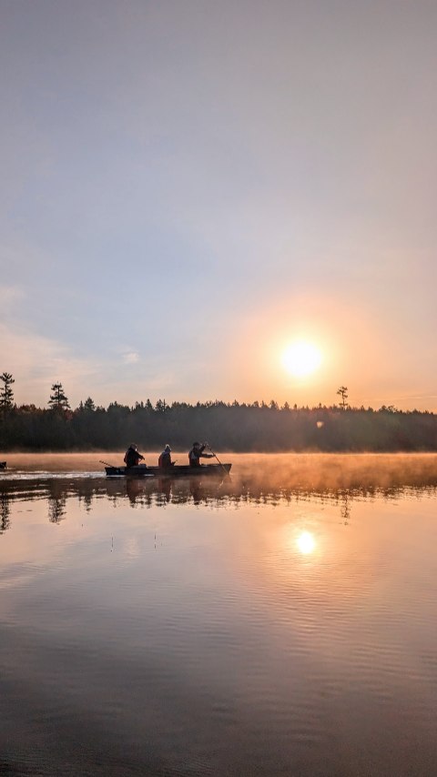 Instagram post by @2traveldads for Visit Maine. Caption reads: Greenville Maine in fall is absolutely beautiful.....