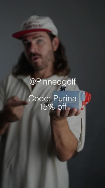 Instagram post by @jakehuttgolf for Pinned Golf. Caption reads: [...] is just cheaper 15% off code ‘purina’....