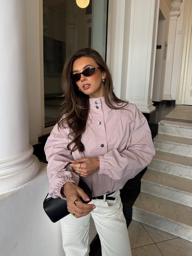 Instagram post by @amelie_weissenberger for NA-KD. Caption reads: [...] we‘re wearing pastels this spring 🍬....