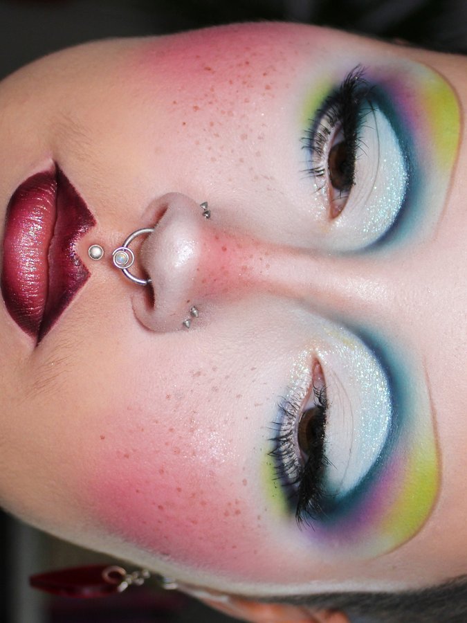 Instagram post by an influencer for Glisten Cosmetics. Caption reads: [...] #creativemakeup #glistencosmetics....