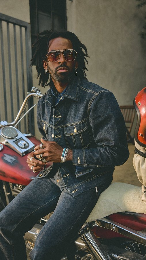 Instagram post by @justinb00ne for John Hardy. Caption reads: Stacking Jewelry is easy with @johnhardyjewelry....