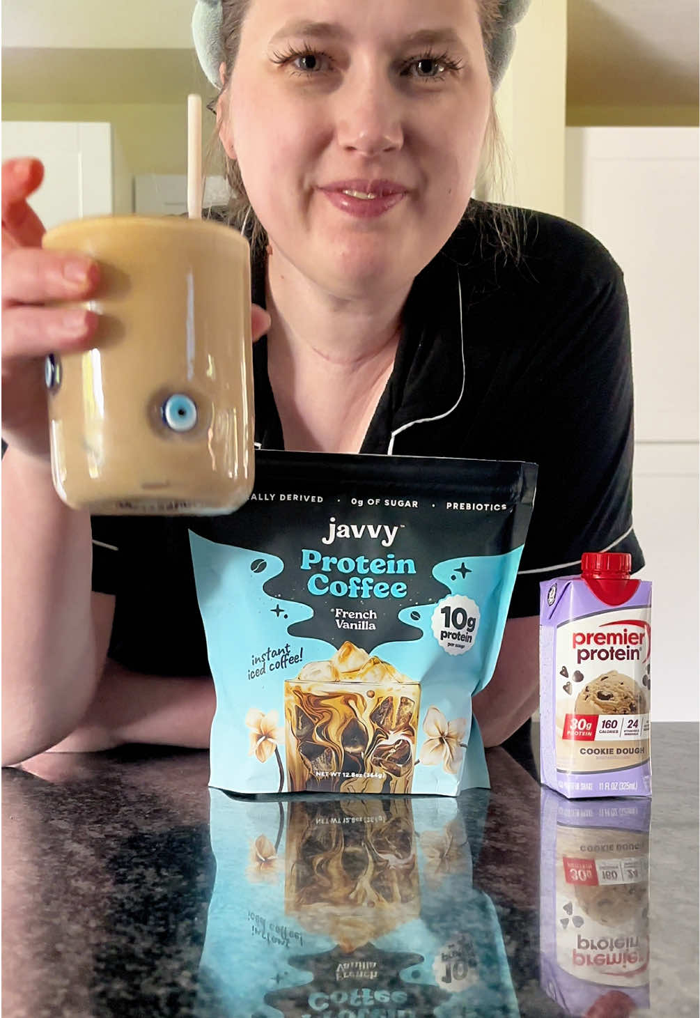TikTok post by @heyitsmamalo for Javy Coffee. Caption reads: 40g of protein to start the day! @Javvy....