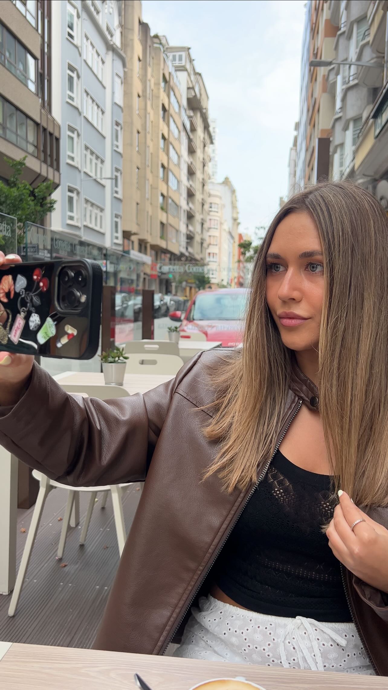 Instagram post by @laurablanco4 for BURGA. Caption reads: best phone cases 🦋🥐💗🧚🏻‍♀️🍓 @burgaofficial....