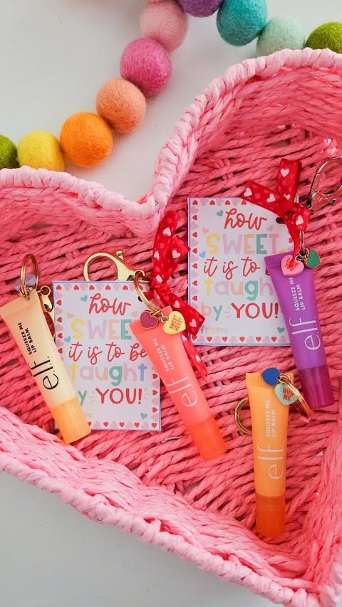 Instagram post by @ashleym.mclaughlin for Michaels Stores. Caption reads: Viral lip gloss charm trend but let's make it....