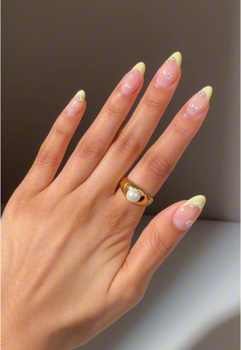 TikTok post by @glossytipped for Alani Nutrition. Caption reads: Color of the szn 🧈 using @GELCARE® sunny side up,....