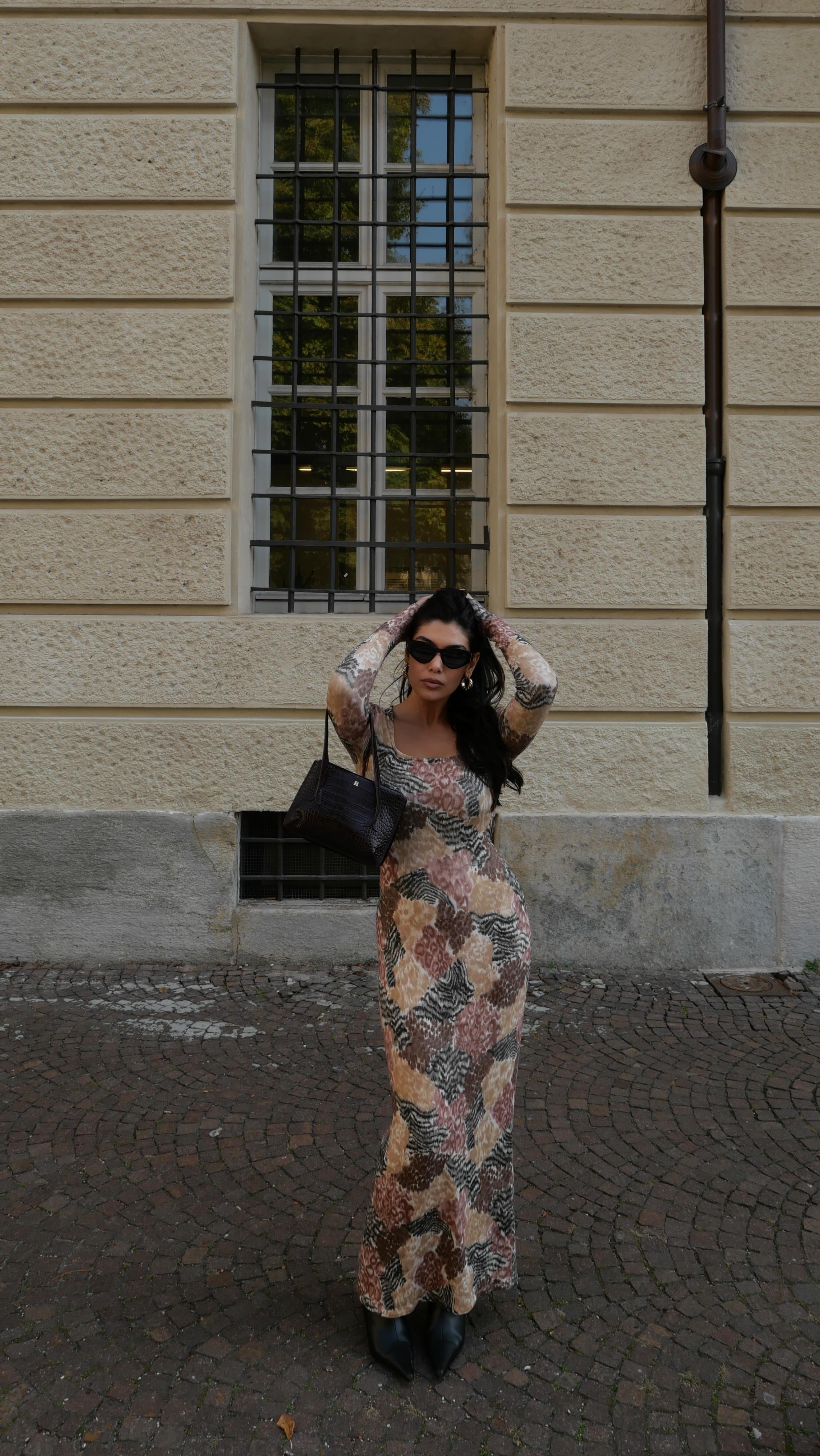 Instagram post by @rita.cap for Rouje. Caption reads: [...] ho preso gusto 🩰🍂🦓
.
.
.
total look....