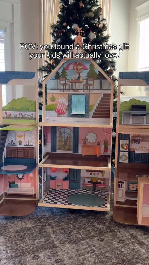 Instagram post by @morganreneemcintyre for KidKraft. Caption reads: [...] a little girl, and this dollhouse....