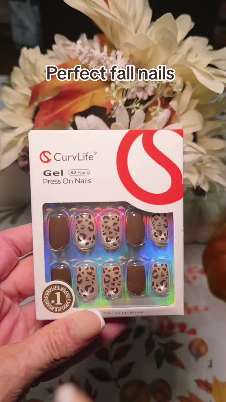 TikTok post by @janetvanness for CurvLife_official. Caption reads: I found the perfect fall nails....