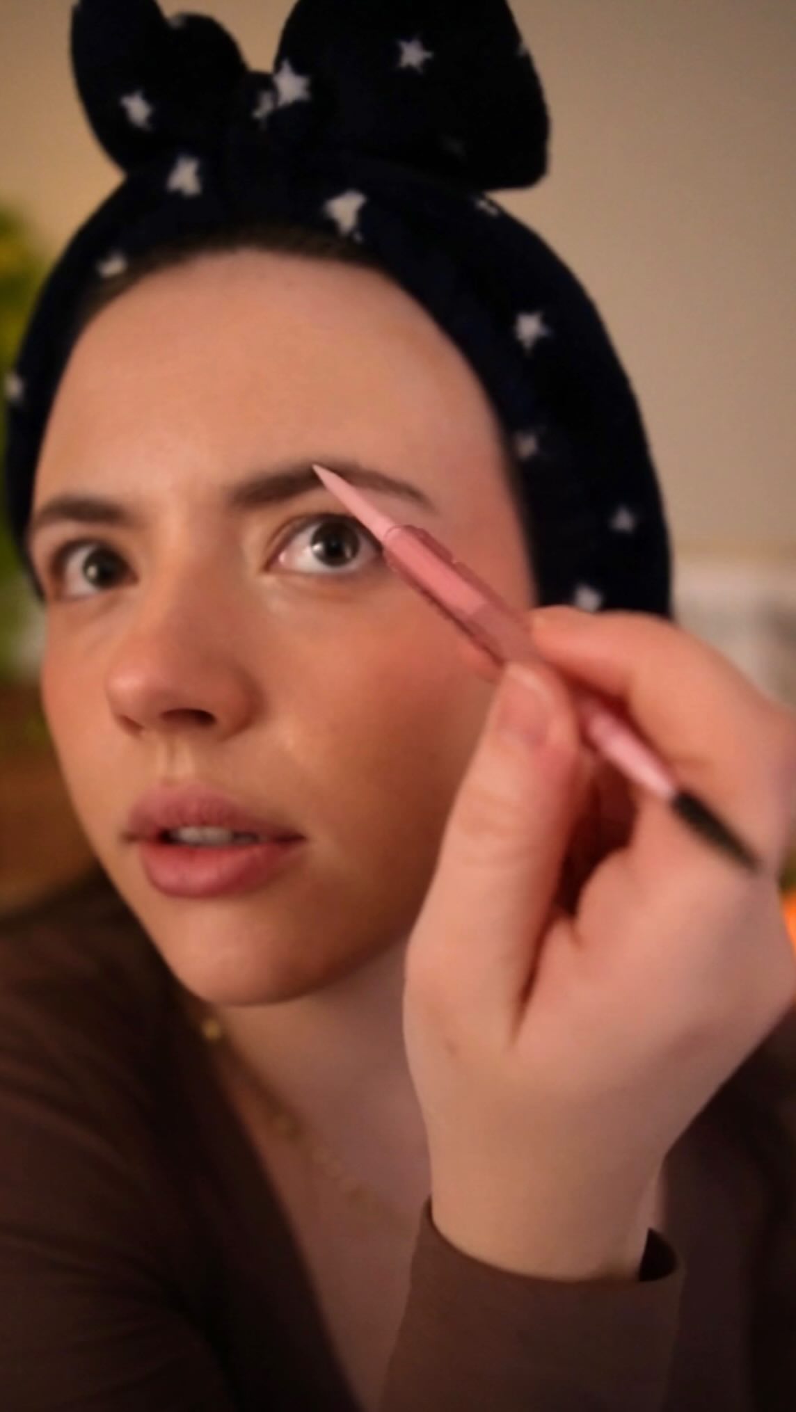 Instagram post by @whispering.willow.asmr for MCoBeauty. Caption reads: Let’s try to do a full face of makeup for under....