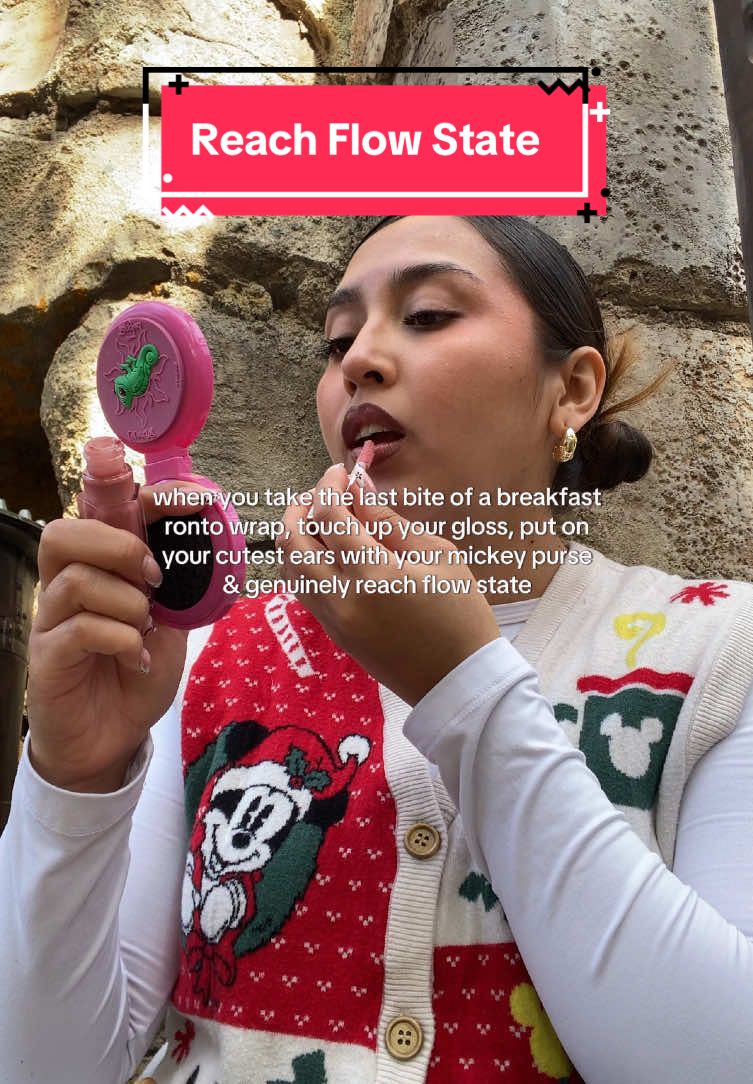 TikTok post by @magicaljeans for BaubleBar. Caption reads: [...] gloss bomb 💣✨ and putting on my fave....