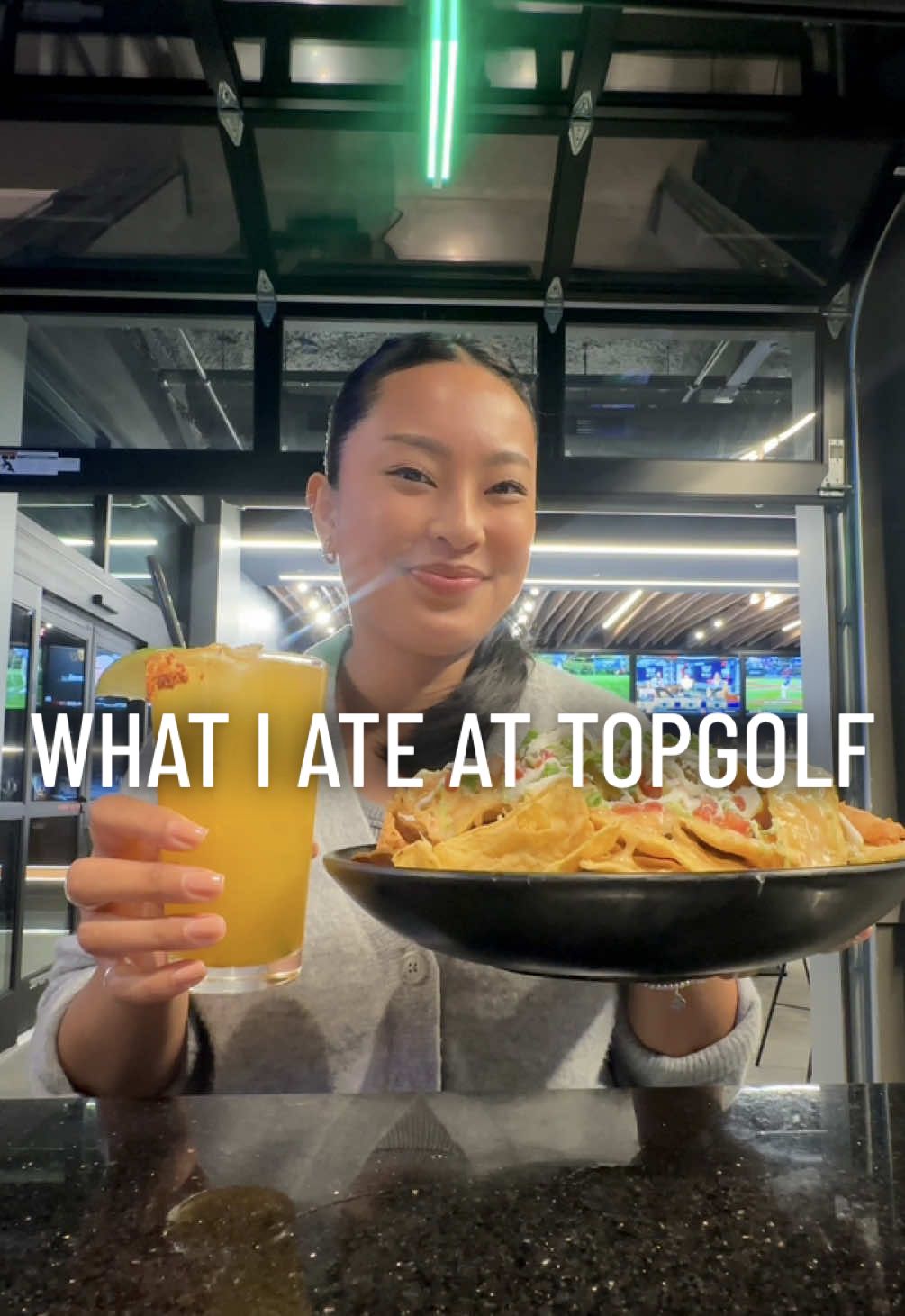 TikTok post by @alyssaabina for Topgolf. Caption reads: for the foodies during football season @Topgolf ‘s....