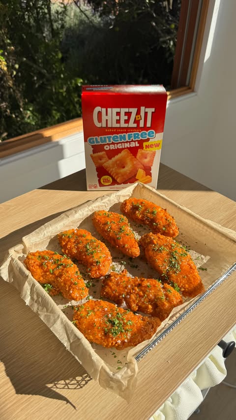 Instagram post by @eat.glutenfreewithme for Cheez-It. Caption reads: Hot Honey @cheezit Chicken Tenders, BABY 🍯🧀....