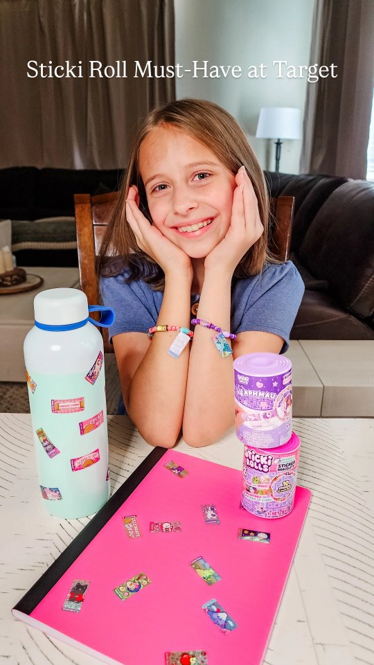 Instagram post by @theclassymamabear for MomSelect. Caption reads: 🤩Sticker magic meets wearable fun! 💖 #Ad My....