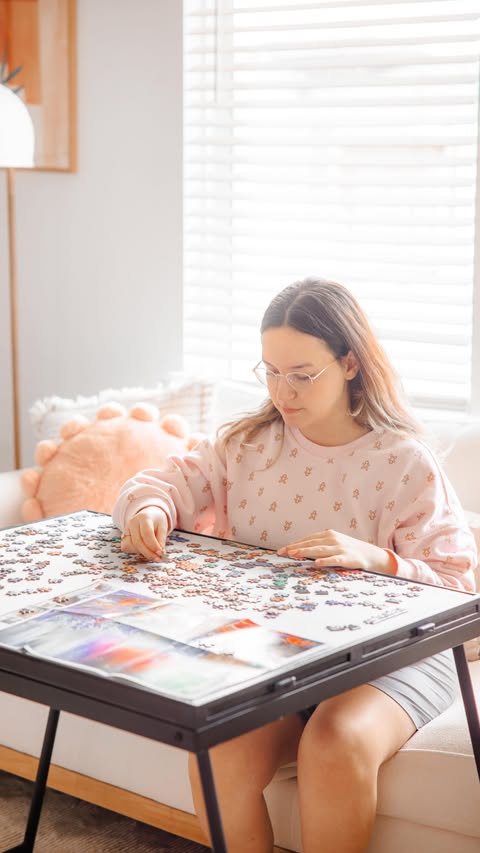 Instagram post by an influencer for Temu. Caption reads: [...] up this puzzle table from Temu and honestly....