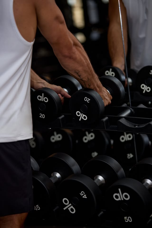 Instagram post by @kylerussellhoffman for Alo Moves. Caption reads: Dropping next week: a new essential for your gym....