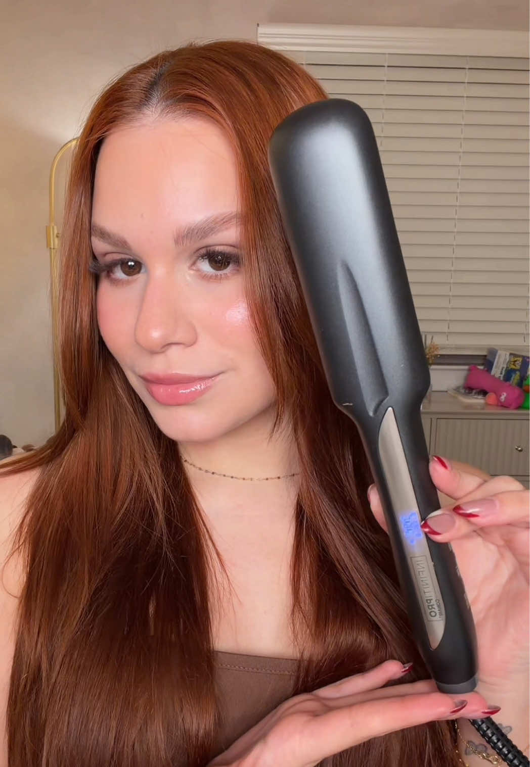 TikTok post by @angelamachadobeauty for Conair. Caption reads: @Conair Haircare amazing!! #conair #conairhair.