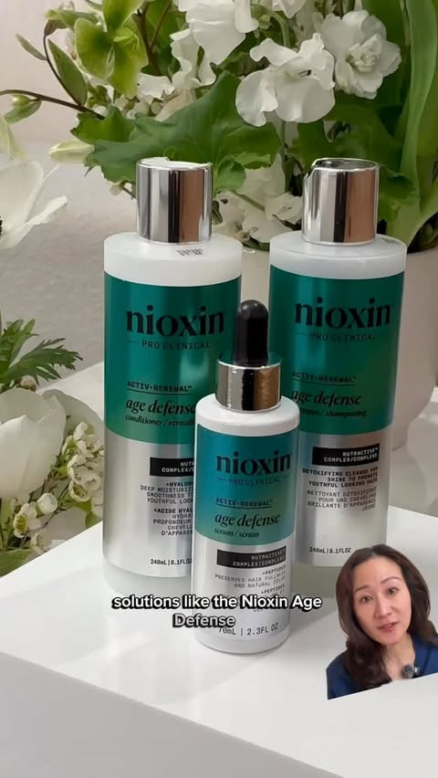 Instagram post by @derm.talk for NIOXIN. Caption reads: Address aging hair early. Shop @nioxin Age Defense....